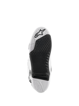Alpinestars Tech 10 Boots, Motocross Boots, White and Black, bottom view of the sole featuring a textured grip pattern, Alpinestars logo, and a replaceable central insert for off-road racing.
