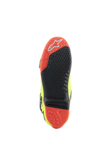 Alpinestars Tech 10 Boots, Motocross Boots, Yellow Fluo Black Red Fluo, sole view featuring red and black dual-compound material, replaceable central grip insert, and traction lugs for off-road performance.