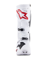 Alpinestars Tech 10 Supervented Boots, White and Bright Red, front view showing ventilated perforated panels, large red star logo on the shin plate, adjustable silver buckles, and high-performance motocross design.