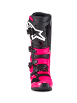 Alpinestars Tech 7 Boots, Motocross Boots, Diva Pink Black, front view, featuring a bright pink TPU shell and straps, black shin plate with a large white Alpinestars star logo, and secure black buckles.