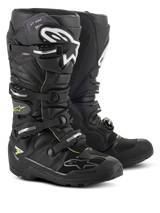 Alpinestars Tech 7 Enduro Drystar® Boots, professional motocross and enduro footwear, Black and Gray with white branding and silver buckles, rugged waterproof design with heavy-duty soles for off-road performance