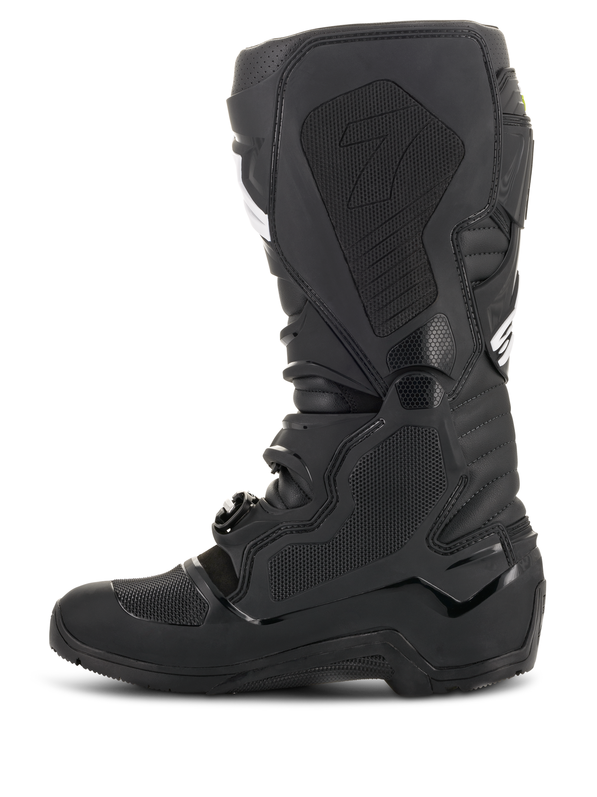 Alpinestars Tech 7 Enduro Drystar® Boots, Black, side profile view showing the medial side with textured honeycomb grip panels and the '7' logo, waterproof off-road motorcycle footwear for enduro racing.