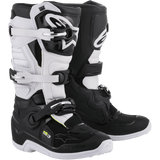 Alpinestars Women Stella Tech 3 Boots, Motocross Off-Road Boots, Black and White, featuring a three-buckle closure system, white TPU shin plates with Alpinestars branding, black microfiber upper with white panels, white soles, protective performance footwear for female riders