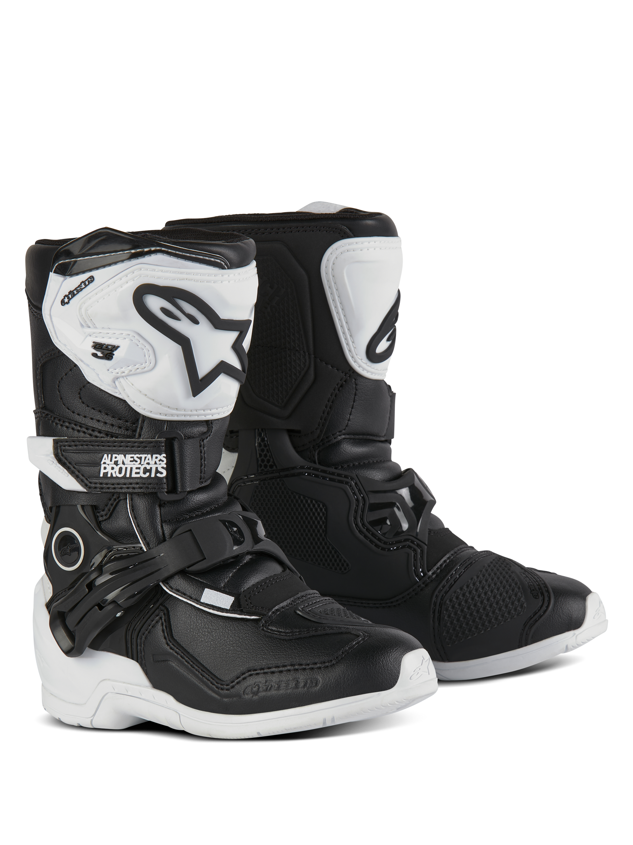 Alpinestars Kids Tech 3S Boots, Motocross Boots, Black and White, featuring white TPU shin plates with black Alpinestars logos, adjustable buckle and hook-and-loop closures, durable rubber outsoles for youth off-road protection.