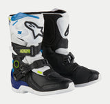 Alpinestars Kids Tech 3S Boots, Youth Motocross Boots, White Black and Enamel Blue, featuring white and black protective panels, blue accents on the heel and top, neon yellow branding, and a secure buckle closure system.
