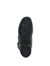 Alpinestars Tech 5 Boots, bottom view of sole, black rubber with textured grip patterns, featuring Alpinestars star logo and branding, durable design for motocross and off-road traction