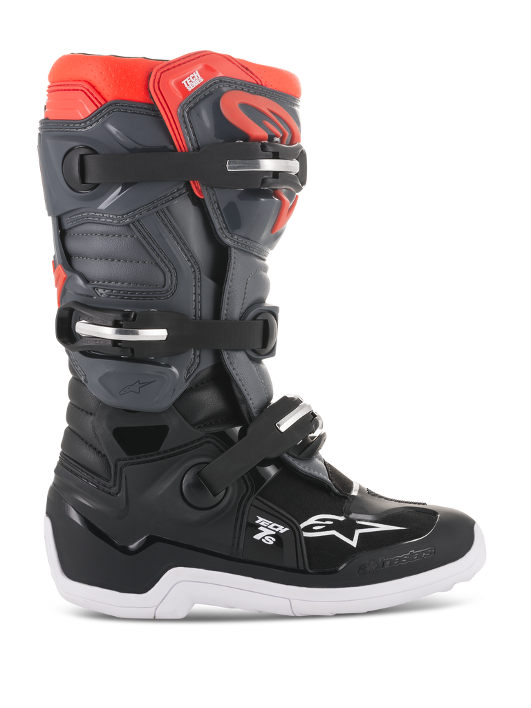 Alpinestars Youth Tech 7S Boots, Motocross Off-road Boots, Black Dark Gray and Red Fluorescent, high-top structure with three adjustable buckles, reinforced toe and heel, thick white sole with grip patterns, durable TPU protection and synthetic upper