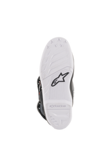 Alpinestars Youth Tech 7S Boots, Motocross Boots, bottom sole view in white, featuring black Alpinestars star logo and embossed branding, durable compound construction with high-performance grip pattern