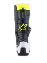 Alpinestars Youth Tech 7S Boots, Motocross Boots, Black, White and Yellow Fluo, rear view featuring a white heel protector and neon yellow Alpinestars logo, durable off-road racing footwear for junior riders