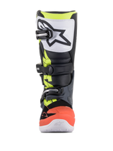 Alpinestars Youth Tech 7S Boots, Motocross Boots, Dark Gray, Fluorescent Red and Yellow with white accents, front view featuring a white TPU shin plate with black logo, triple buckle closure system, and durable synthetic construction for junior off-road riders