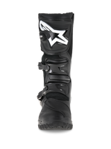 Alpinestars Corozal Adventure Drystar® Boots, Black adventure touring boots, front view featuring a prominent white logo on the shin plate, durable multi-material construction with buckle closures, designed for all-weather motorcycle riding.