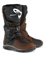 Alpinestars Corozal Adventure Drystar Oiled Leather Boots, Brown and Black, tall adventure touring motorcycle boots featuring dual buckle closure, white Alpinestars logo on the shin plate, and rugged all-terrain outsoles