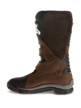 Alpinestars Corozal Adventure Drystar® Oiled Leather Boots, Adventure Motorcycle Boots, Brown and Black, side view featuring premium oiled leather and suede construction, textured medial grip panels, black protective shin plate with white logo, and rugged vulcanized rubber outsole.
