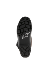 Alpinestars Corozal Adventure Drystar® Oiled Leather Boots, sole view showing black vulcanized rubber with rugged tread pattern, white Alpinestars logo, designed for adventure touring and off-road grip