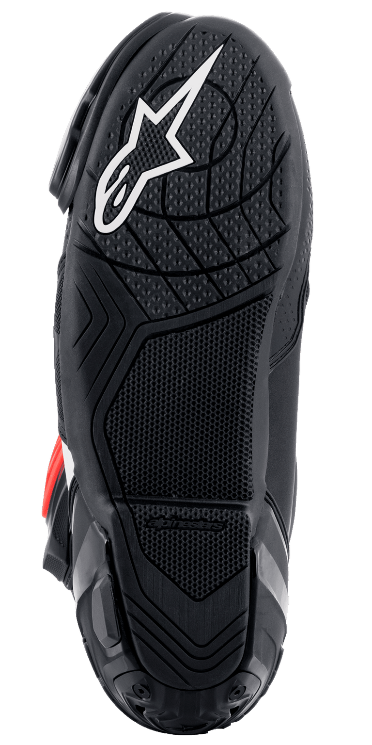 Alpinestars Supertech R Boots, bottom sole view, black lightweight rubber compound with textured grip pattern, white Alpinestars star logo, performance motorcycle racing footwear