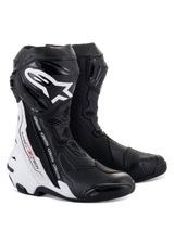 Alpinestars Supertech R Vented Boots, Motorcycle Racing Boots, Black and White, featuring extensive perforations for ventilation, bold white branding on the shin, TPU protectors, and sleek aerodynamic design for track performance.