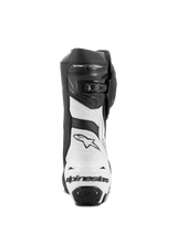 Alpinestars Supertech R Vented Boots, Motorcycle Racing Boots, Black and White, rear view showing white perforated microfiber panels, black TPU heel protector with Alpinestars logo, and adjustable closure system
