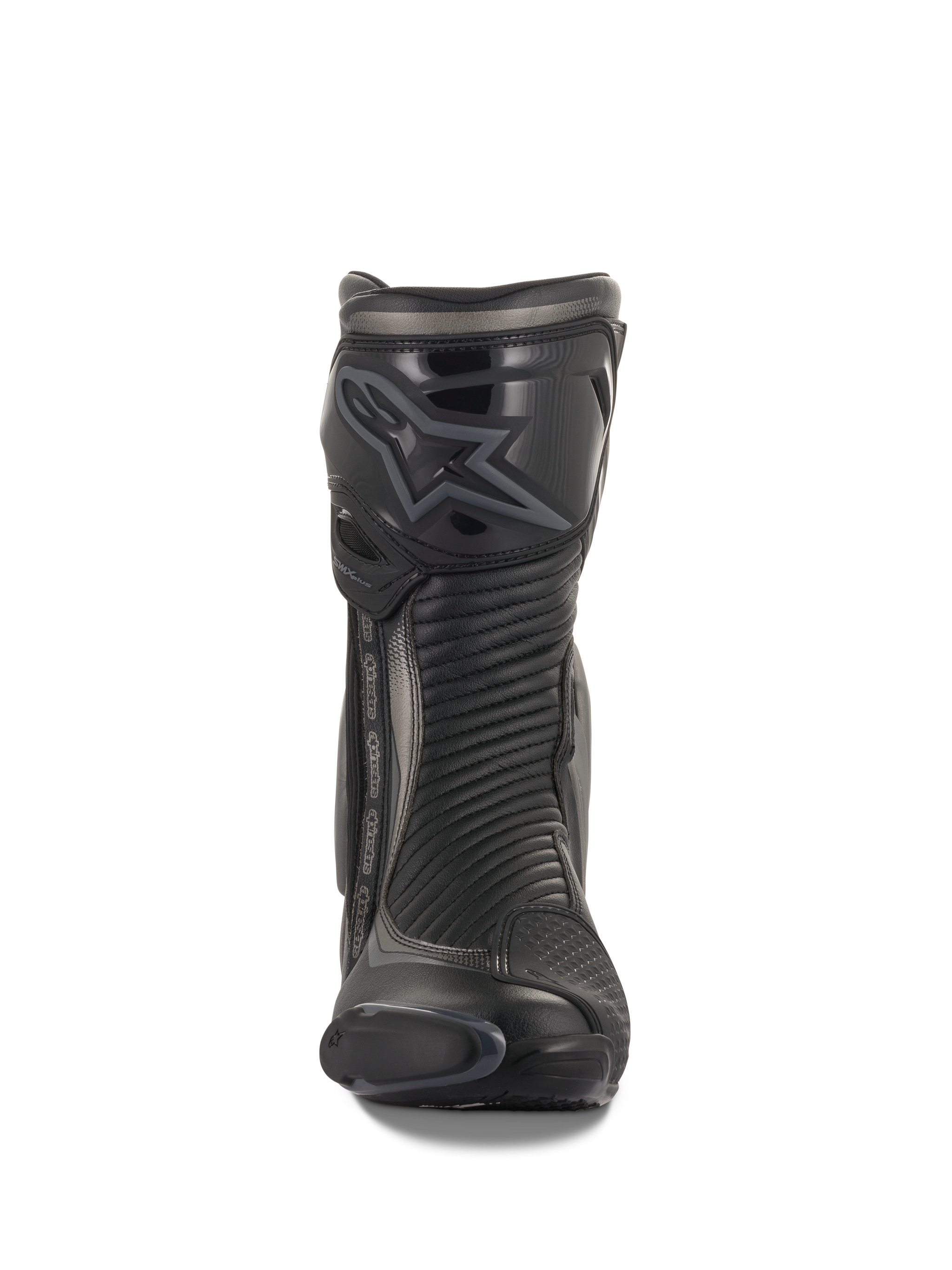 Alpinestars SMX Plus V2 Boots, Racing and Sport Motorcycle Boots, Black and Dark Gray, front view featuring a contoured TPU shin protector with Alpinestars logo, accordion flex panels for movement, and a sleek aerodynamic profile for performance riding.