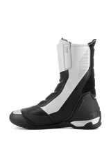 Alpinestars SP-X BOA Boots, mid-height sport motorcycle boots, Black and Silver, sleek side profile featuring silver panels with perforated details, black TPU heel counter, and Alpinestars branding.