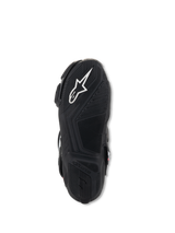 Alpinestars Stella SMX-6 V3 Boots, bottom sole view, black lightweight rubber with textured grip patterns, featuring white Alpinestars logo and embossed branding for traction and pedal control