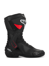 Alpinestars SMX-6 V3 Drystar Boots, motorcycle sport riding boots, black with red and white accents, side profile view, waterproof microfiber construction, TPU lateral ankle brace with red detailing, white logos on the shin and heel, integrated toe slider and mesh flex zones