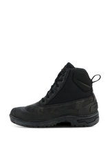 Alpinestars Woman Judy Waterproof Boots, Black motorcycle riding boots, combat-inspired high-top design with side profile view, featuring laces and rear pull loop, elevated rubber sole, durable leather and textile construction for urban riding