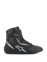 Alpinestars Fastback 2 Drystar Waterproof Shoes, Black and White High-Top Motorcycle Sneakers, side profile featuring white star logo and silver accents, lace-up closure with hook-and-loop strap, waterproof urban riding footwear