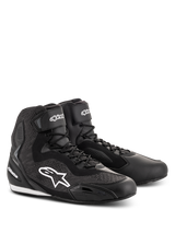 Alpinestars Faster-3 Rideknit® Shoes, Black motorcycle riding shoes, featuring knitted mesh panels and a microfiber chassis, white Alpinestars star logo on the side, laces with hook-and-loop ankle strap, designed for road racing and urban commuting.