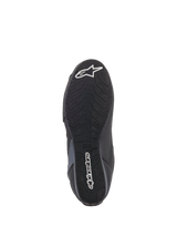 Alpinestars Faster-3 Rideknit® Shoes, sole view, black rubber outsole with wavy traction pattern, featuring white Alpinestars text and star logo, showing grip details for motorcycle riding