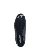 Alpinestars Faster-3 Rideknit® Shoes, Bottom View, Black sole with red accents, featuring textured tread pattern for grip, white Alpinestars star logo on the toe and wordmark on the heel, lightweight motorcycle riding footwear
