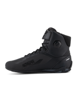 Alpinestars Faster-4 Shoes, Motorcycle Riding Shoes, Black, side profile view, high-top design with lace closure and adjustable top strap, 'Alpinestars Protects' text on lateral side, sleek microfiber upper with integrated protection zones