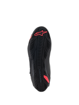 Alpinestars Stella Faster-4 Shoes, bottom view of the sole, Black and Diva Pink, featuring a textured rubber grip pattern, Alpinestars logo on the heel, and integrated shank for support, durable outsole for motorcycle riding