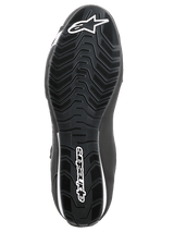 Alpinestars Sektor Shoes, Motorcycle Riding Shoes, Black and White, bottom view of the textured rubber sole with wavy tread pattern, featuring white Alpinestars logo and star symbol.