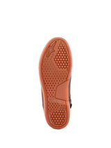 Alpinestars Chrome Crafted Drystar® Shoes, Brown Gum, bottom view showing gum rubber sole with hexagonal grip pattern and embossed Alpinestars branding, urban motorcycle riding footwear