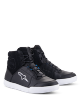 Alpinestars Chrome Drystar® Shoes, Urban Motorcycle Riding Shoes, Black and White with Blue accents, high-top sneaker design featuring leather and suede upper, white contrast sole and white Astars logo, waterproof footwear for street riding