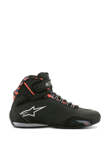 Alpinestars Sektor Waterproof Shoes, Black with Dark Gray and Red Fluo accents, side profile of a motorcycle riding shoe, features white Alpinestars logo, red camouflage pattern on the ankle, velcro strap, and waterproof construction for road riding