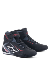 Alpinestars Sektor Waterproof Shoes, motorcycle riding shoes, black with red and white accents, featuring white star logo on the side, velcro ankle strap, and lacing system, sleek athletic design for road riding