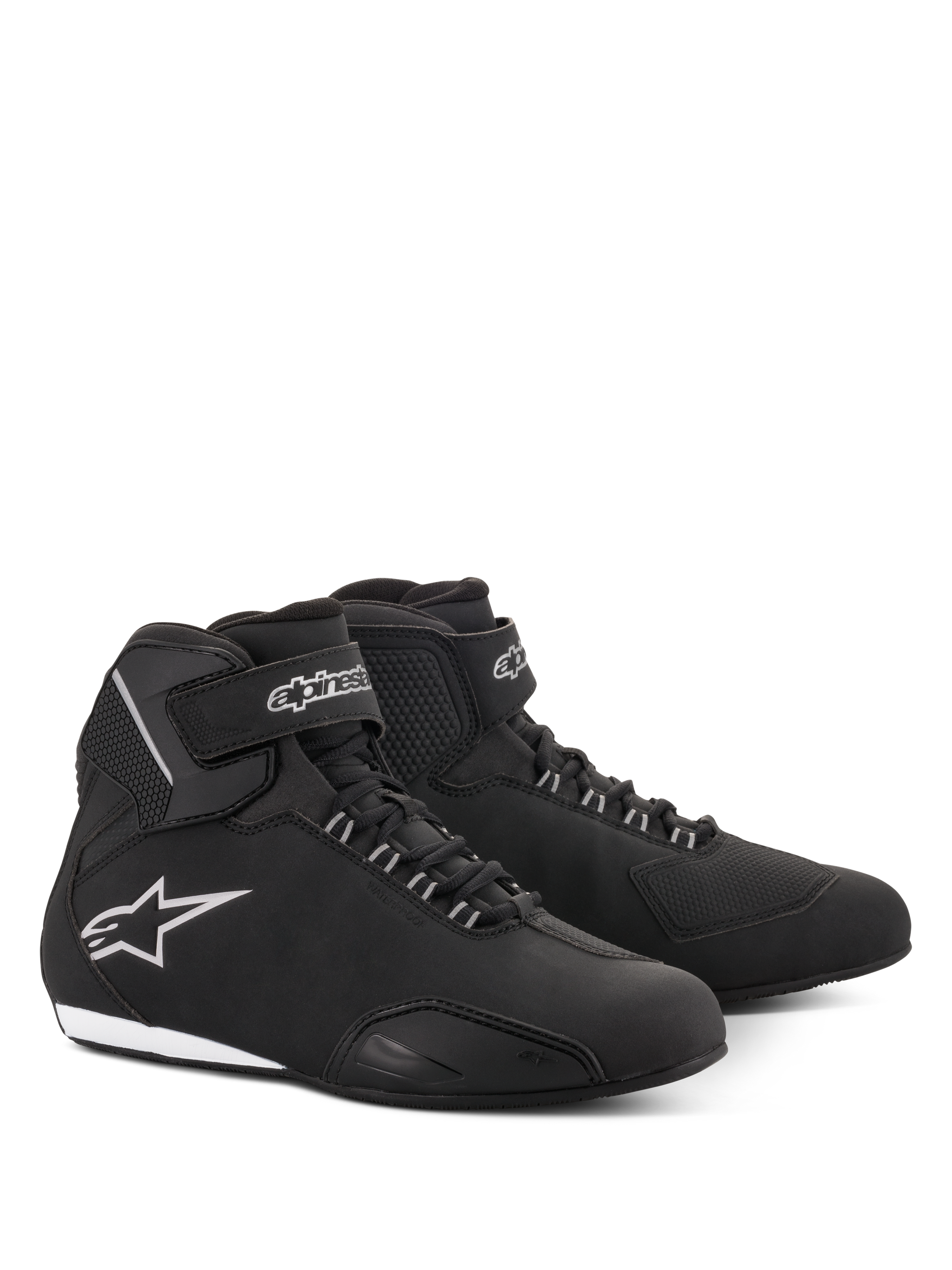 Alpinestars Women Stella Sektor Waterproof Shoes, Motorcycle Riding Shoes, Black and Silver, sleek microfiber upper with lace-up closure and velcro ankle strap, featuring a silver Alpinestars star logo on the side and a slim rubber sole.