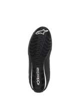 Alpinestars Women Stella Sektor Waterproof Shoes, bottom view of the black rubber sole, featuring a textured wavy grip pattern for traction, white Alpinestars star logo and wordmark, designed for water run-off and grip.
