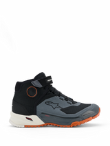 Alpinestars CR-X Drystar Riding Shoes, Motorcycle Riding Shoes, Black Dark Gray and Rust, featuring a high-top design with Velcro ankle strap, waterproof Drystar membrane, white midsole, and bright orange rugged outsole