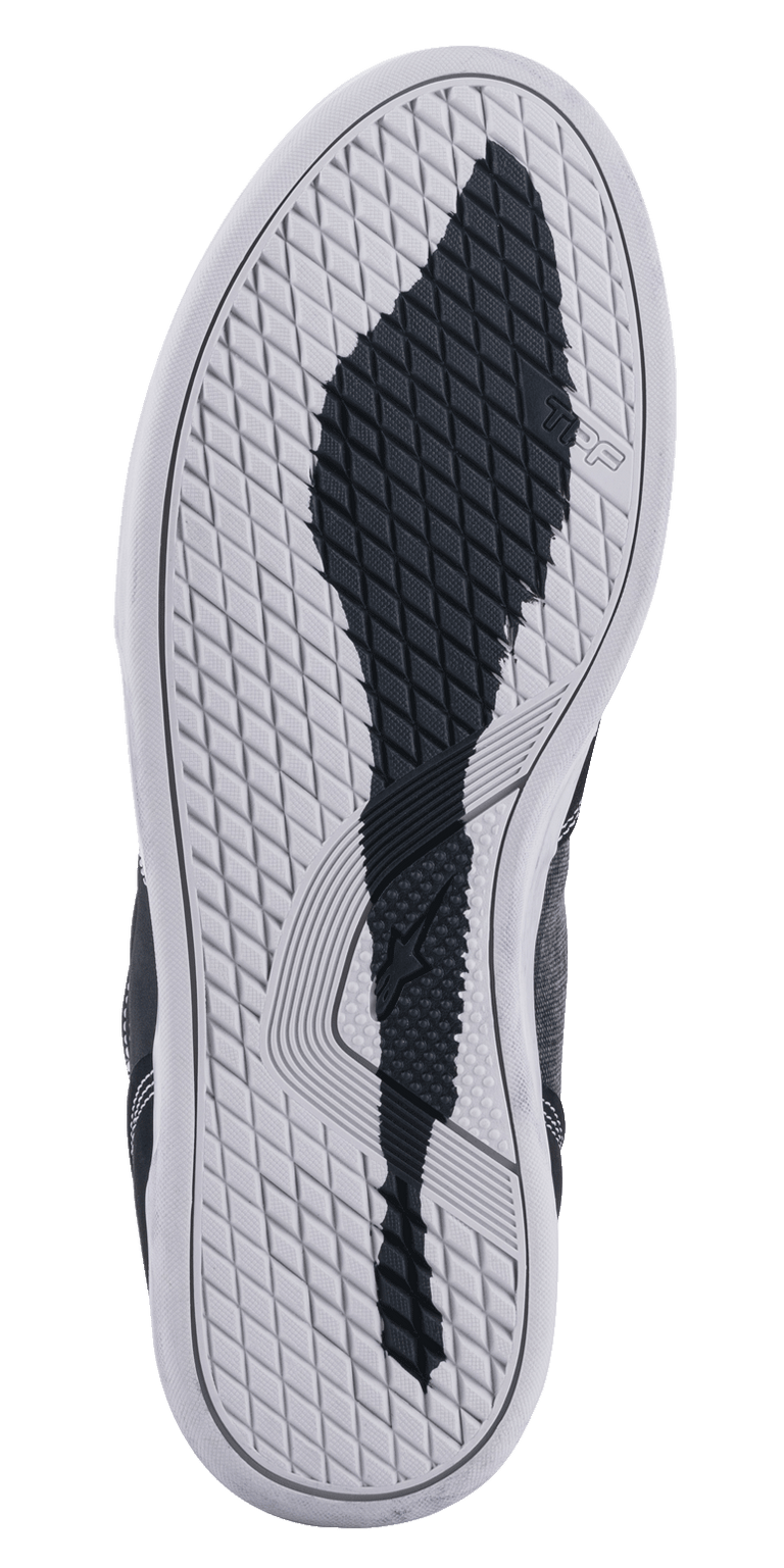 Alpinestars Ageless Riding Shoes, Bottom Sole View, White Rubber Outsole with a Black Textured Grip Pattern, featuring TPF and Alpinestars star logos, diamond-shaped tread for motorcycle urban riding