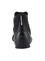 Alpinestars Supertech Shoes - FIA/SFI, Auto Racing Shoes, Black, Rear view featuring carbon fiber heel cup and knitted upper, vertical Alpinestars branding on heel, professional motorsport gear