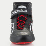 Alpinestars Tech-1 KX V3 Shoes, Karting Shoes, Black White and Red, front view featuring red asymmetric lacing, a black Velcro ankle strap with white branding, and an FIA 8877-2022 certification tag visible on the tongue.