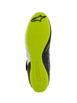 Alpinestars Tech-1 KX V3 Shoes - FIA, karting shoes, bottom view of the sole, bright yellow fluo rubber with textured grip pattern, featuring black Alpinestars logo and embossed branding for pedal sensitivity