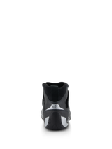 Alpinestars Tech-1 Z V3 Shoes FIA, Auto Racing Shoes, Black and Silver, rear view showing contoured heel with silver accents and star logo, professional motorsport footwear
