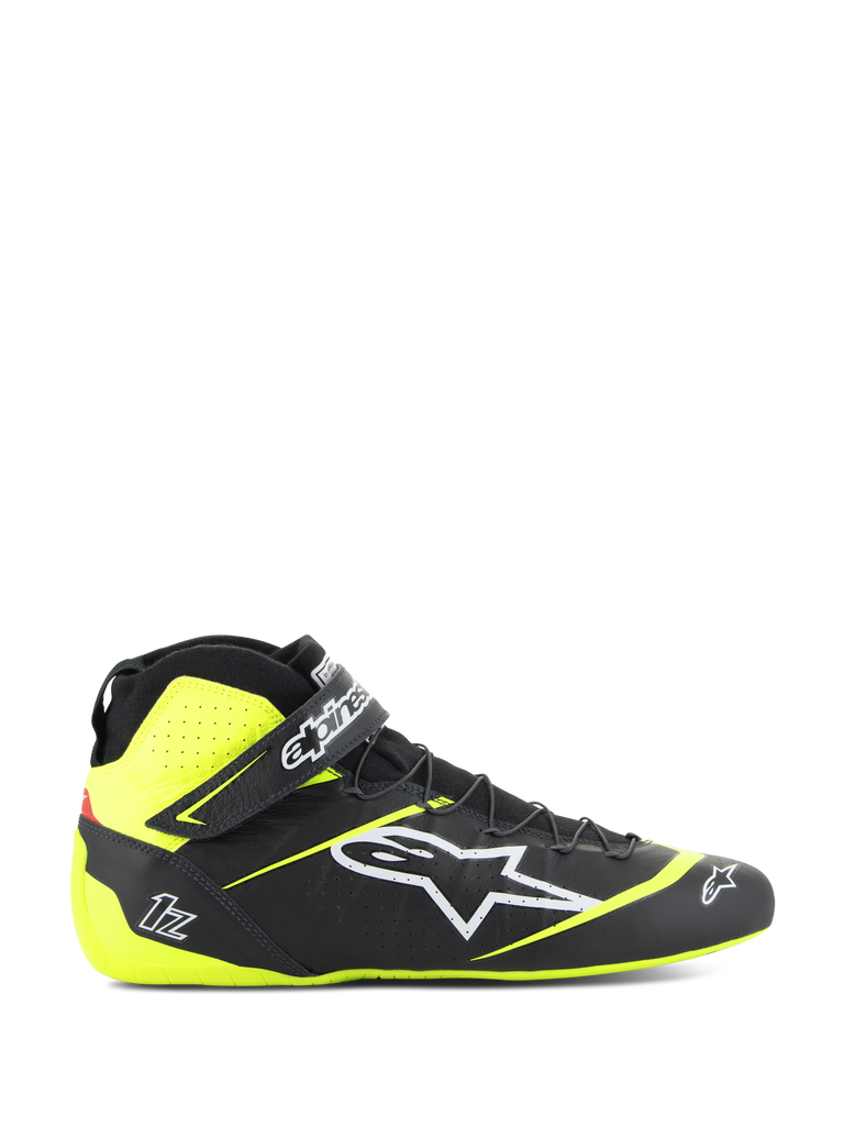 Alpinestars Tech-1 Z V3 Shoes FIA, Auto Racing Shoes, Black and Yellow Fluo, side profile of high-top motorsport footwear, white star logo, perforated design for breathability, adjustable ankle strap, thin rubber sole.