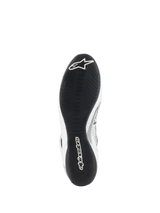 Alpinestars Tech-1 Z V3 Shoes FIA, Auto Racing Shoes, White and Black, bottom view showing the F1-derived thin rubber outsole with asymmetric tread, white Alpinestars logo on the toe and branding on the heel