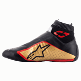 Alpinestars Supermono V2 Shoes FIA, Auto Racing Shoes, Black Gold and Red, side profile view featuring a sleek one-piece leather construction, gold side panel with black star logo, red accents, and a ribbed elastic collar.