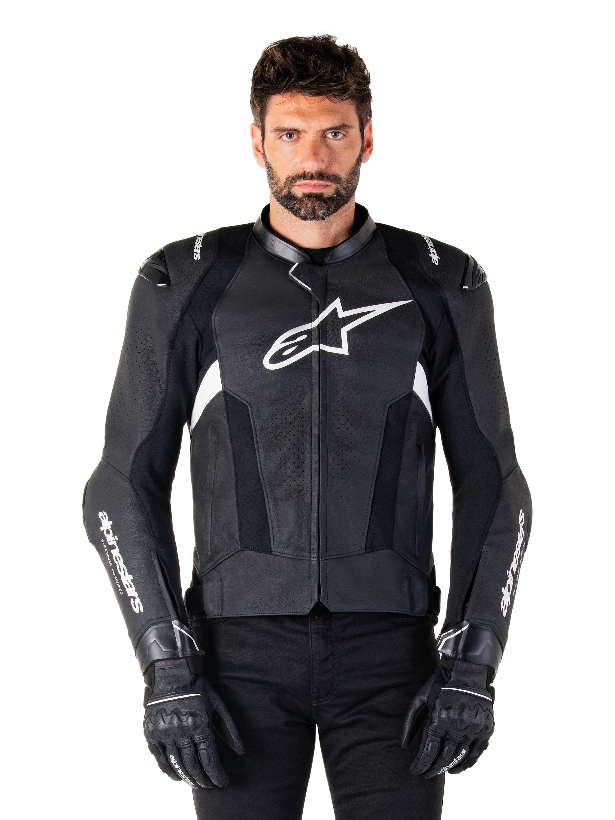 Alpinestars Missile V3 Leather Jacket, Black with White Logos, worn by a model with black riding gloves, premium leather motorcycle racing jacket with perforated ventilation panels and performance riding features