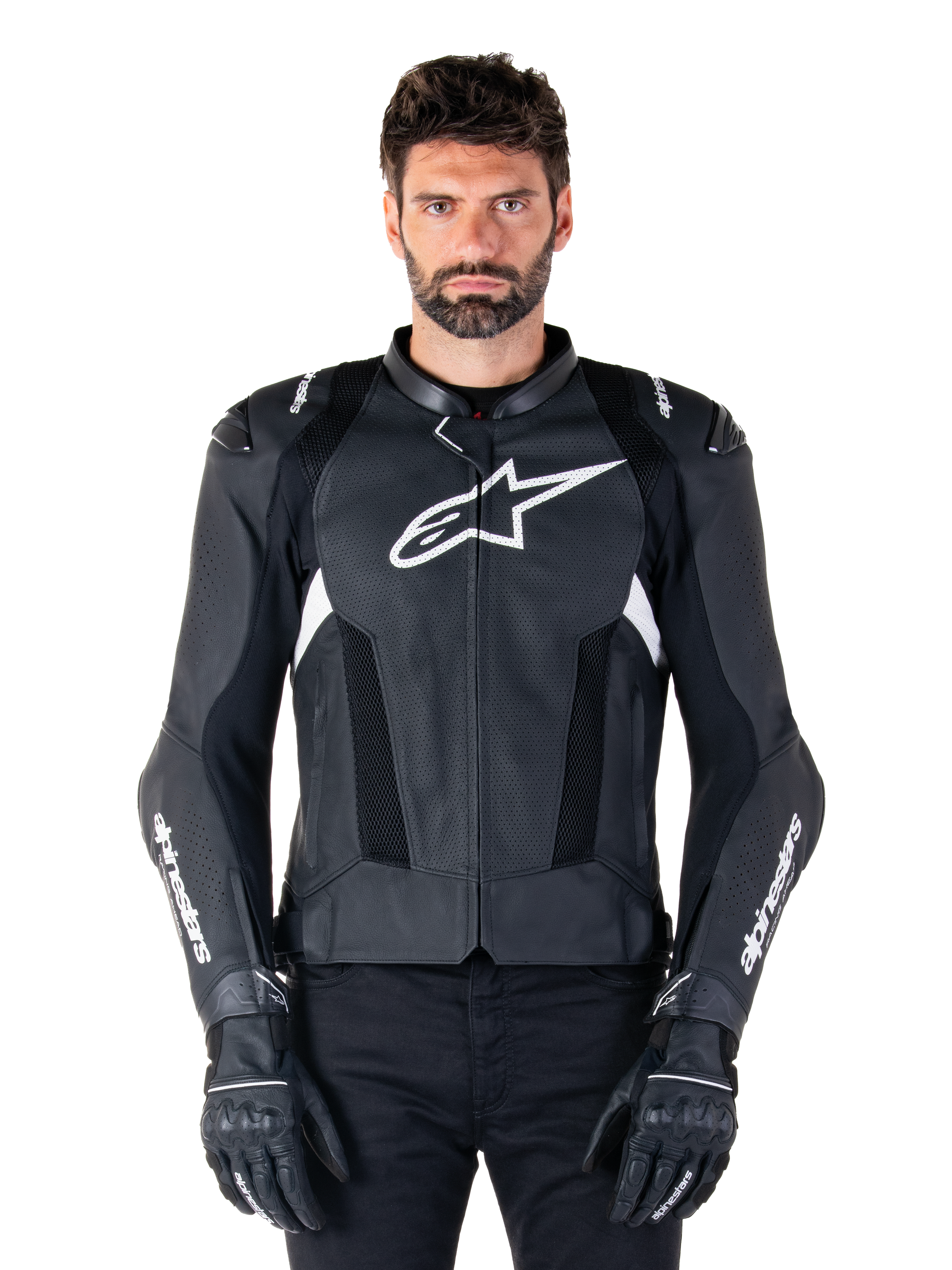Alpinestars Missile V3 Airflow Leather Jacket, Black and White, motorcycle racing jacket with perforated leather ventilation panels, large white star logo on chest, worn with matching gloves, sporty protective design